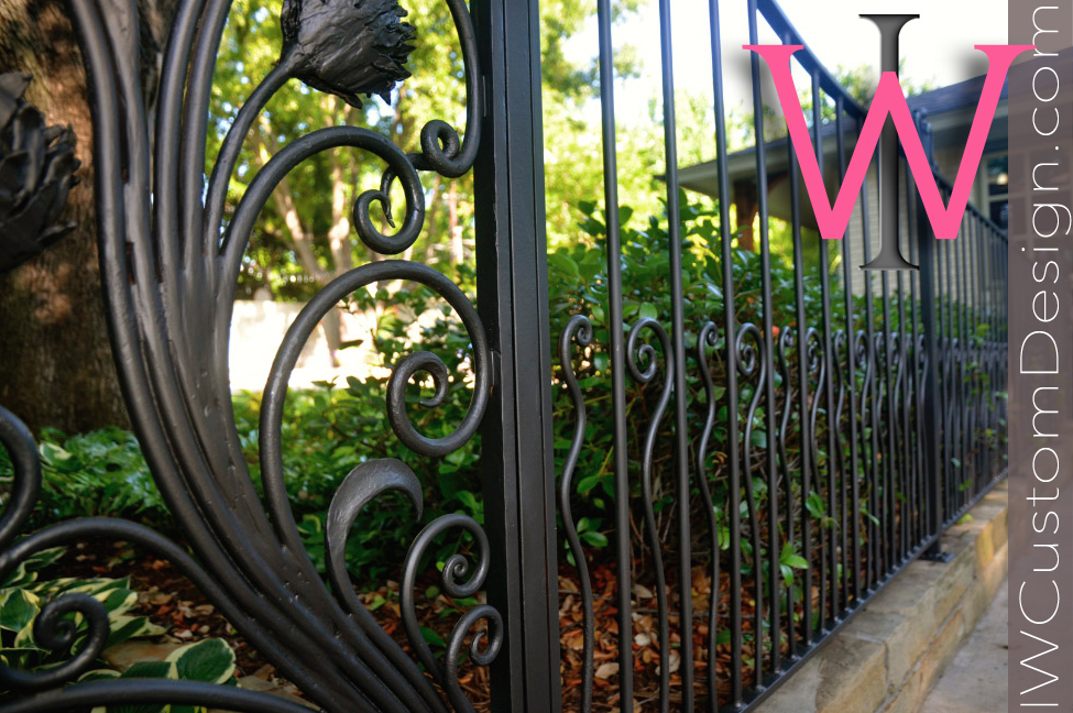 wrought iron garden gate with thistles and dragonfly